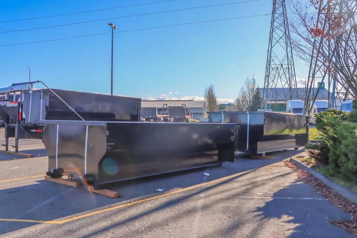 Roll-off dumpster ready for waste disposal at job site for Concrete Dumpster Rental in Lakeway